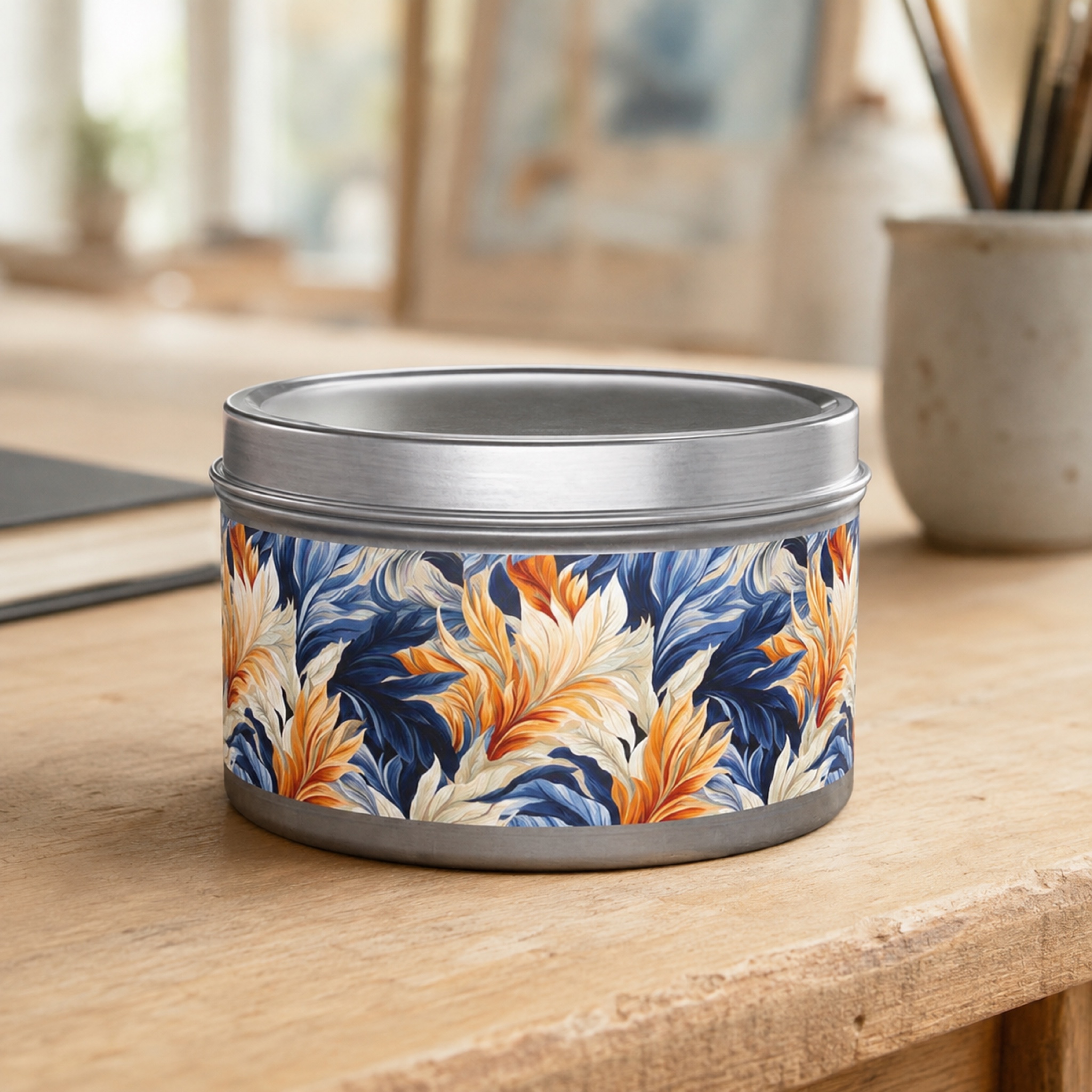 Feathered Fresco Fusion Tin Candle. A Touch of Feathered Grace in Every Flicker. Available in 2 sizes, 3 finishes, and 5 scents.