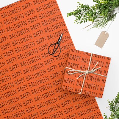 Chic Happy Halloween Wrapping Paper Black on Orange Chic Wrapping Paper for Halloween Gifts and Festive Giving. Available in 2 sizes.